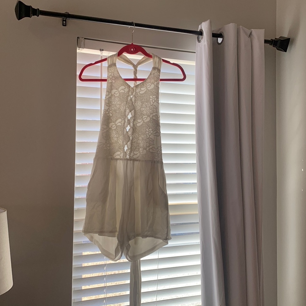Backless white romped
